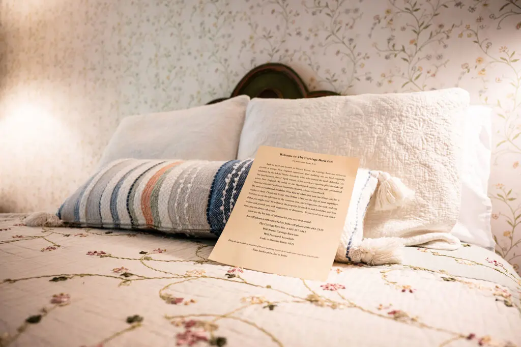 A bed at the Carriage Barn Inn