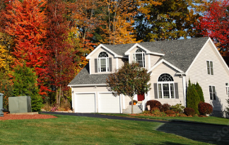 White house surrounded by fall foliage 