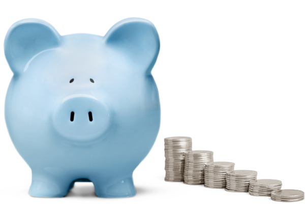 blue piggy bank with coins lined up beside it