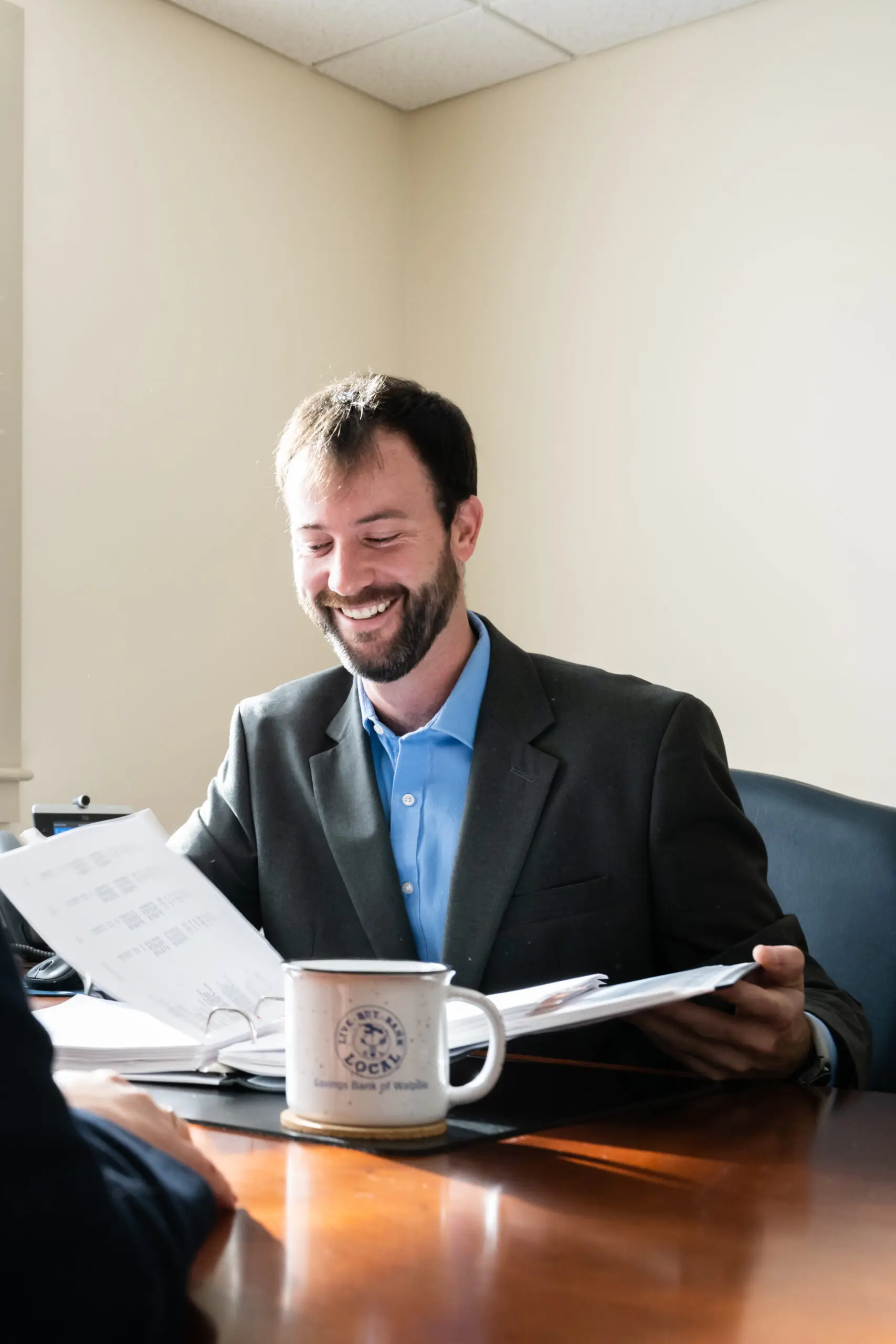 loan officer reviewing files