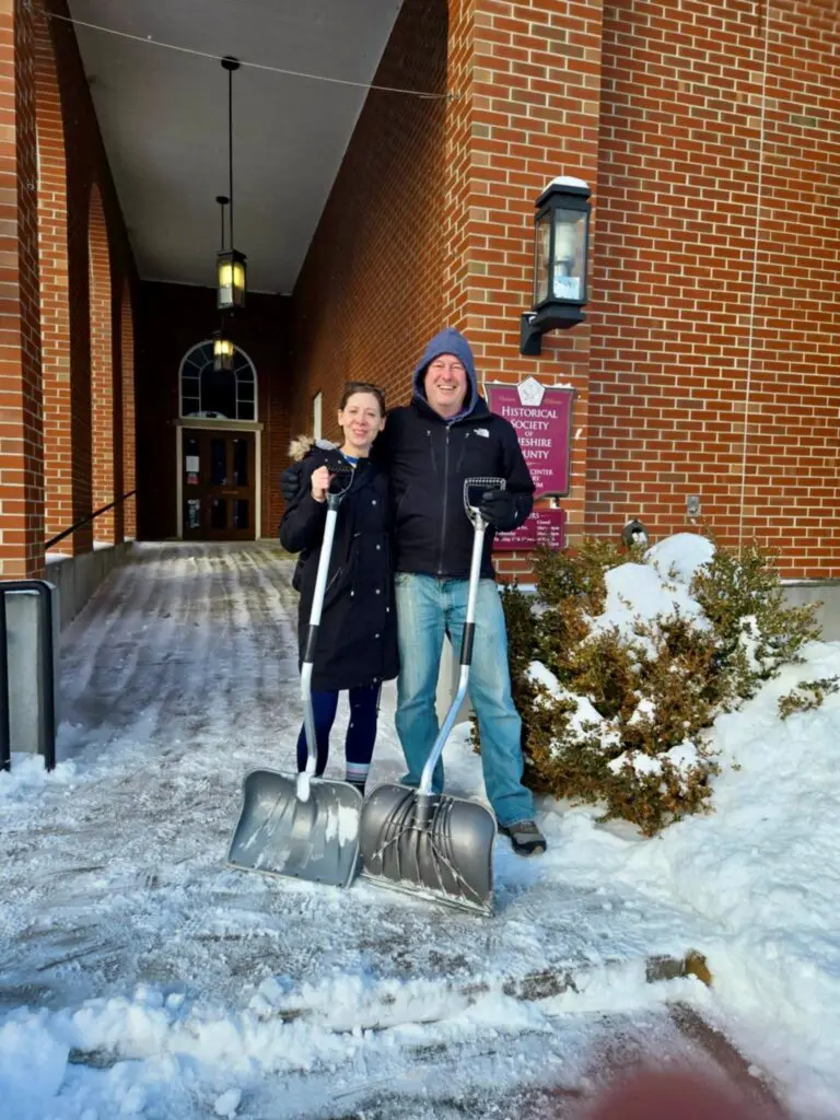Janelle and Dominic shoveling
