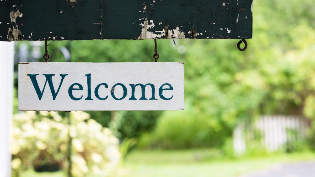 A Welcome sign at the Carriage Barn Inn