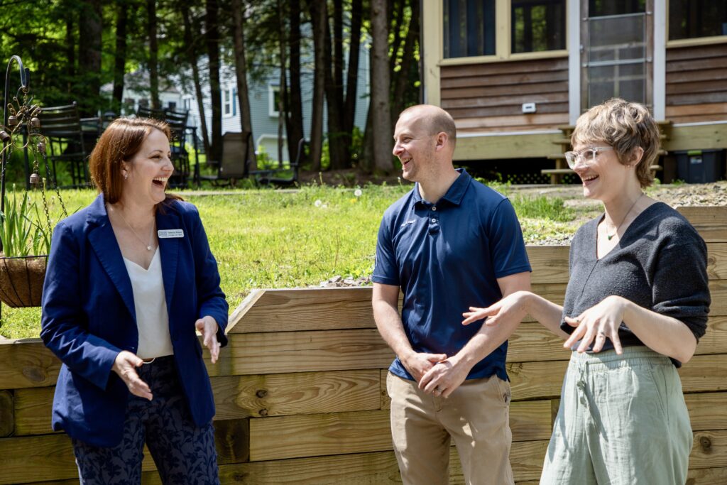 Chris and Victoria McIntosh with Samantha Monson, SBW laughing